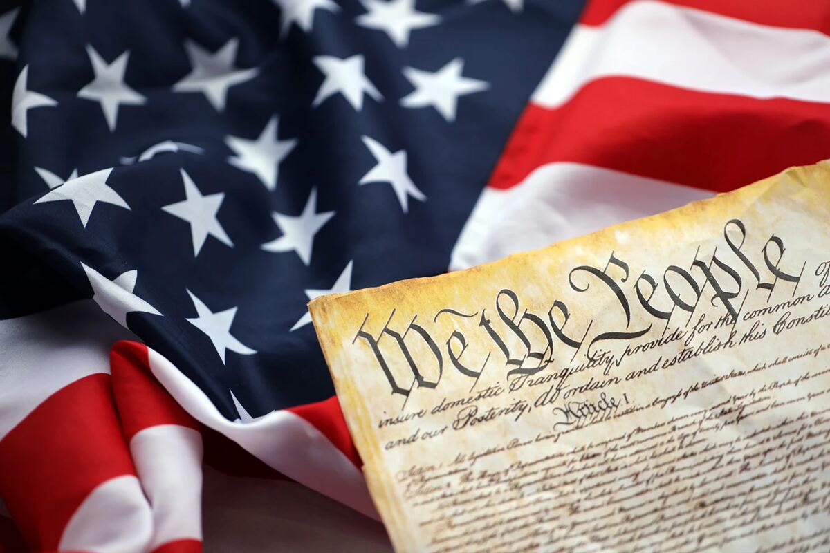 U.S. flag and the words We the People